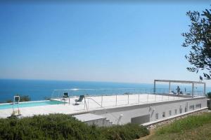 The swimming pool at or close to Stunning Design Villa with unique 180º sea views