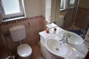 Ein Badezimmer in der Unterkunft Apartment Eve