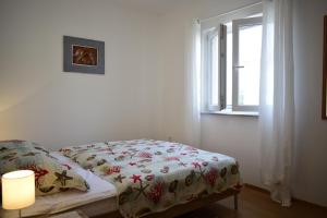 Ein Bett oder Betten in einem Zimmer der Unterkunft Apartment Eve