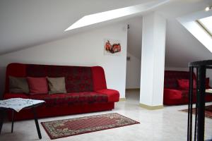 Ein Sitzbereich in der Unterkunft Apartment Eve