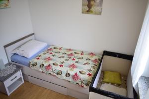 Ein Bett oder Betten in einem Zimmer der Unterkunft Apartment Eve