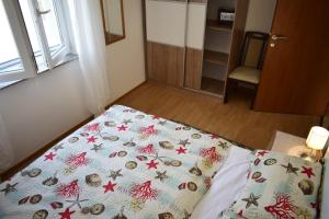 Ein Bett oder Betten in einem Zimmer der Unterkunft Apartment Eve