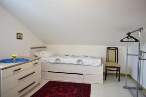 Ein Bett oder Betten in einem Zimmer der Unterkunft Apartment Eve