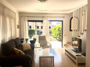 A seating area at Bahia Meloneras Villa