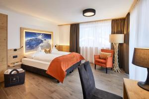 Voodi või voodid majutusasutuse Hotel Tabladel toas