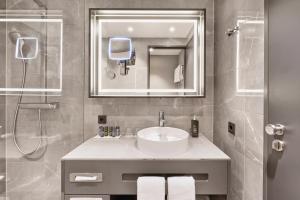 Vannituba majutusasutuses HYPERION Hotel Leipzig