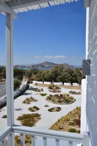 a view of a patio from a balcony at Crystal Mare Suites in Naxos Chora
