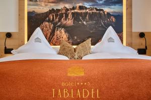 Voodi või voodid majutusasutuse Hotel Tabladel toas