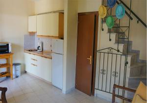 Kuchyň nebo kuchyňský kout v ubytování Eva's Houses Nikiti