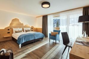 Voodi või voodid majutusasutuse Hotel Tabladel toas