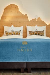Voodi või voodid majutusasutuse Hotel Tabladel toas
