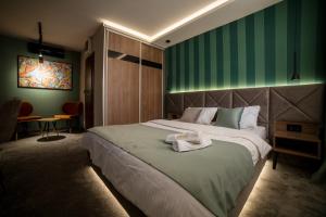 Cama o camas de una habitación en Boutique Luxury Apartments