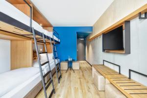 Postel nebo postele na pokoji v ubytování H2 Hotel Leipzig
