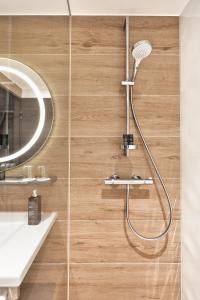 Koupelna v ubytování H2 Hotel Leipzig