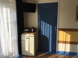 Kuchyň nebo kuchyňský kout v ubytování Carels Kamers Texel
