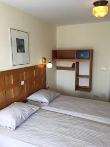 Postel nebo postele na pokoji v ubytování Carels Kamers Texel