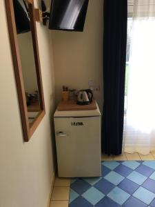 Kuchyň nebo kuchyňský kout v ubytování Carels Kamers Texel