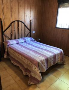 Säng eller sängar i ett rum på Casa de Inés