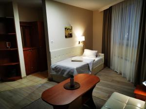 Postel nebo postele na pokoji v ubytování Hotel Passione