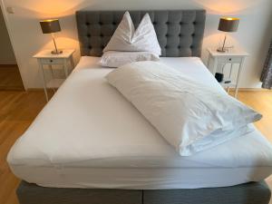 Letto o letti in una camera di Aparthome L.I.N.Z.