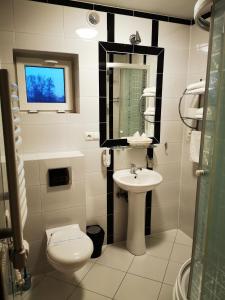 Koupelna v ubytování Hotel Passione