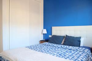 Łóżko lub łóżka w pokoju w obiekcie 2 bed penthouse, Bolnuevo
