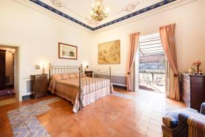 Кровать или кровати в номере Masseria Rossella