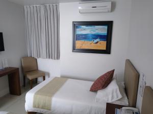 Postel nebo postele na pokoji v ubytování Suites Chapultepec