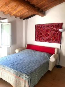 Postel nebo postele na pokoji v ubytování Il Pezzatino