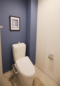 Ванная комната в TABISAI HOTEL Luxe 博多