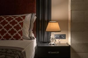 Posteľ alebo postele v izbe v ubytovaní Grand Master Suite