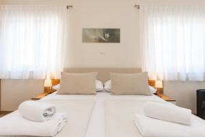 Postel nebo postele na pokoji v ubytování Guest House Ankora