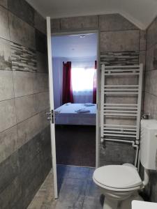 Koupelna v ubytování Hotel Hobby