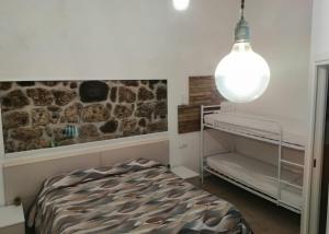 Postel nebo postele na pokoji v ubytování B&B Ninfa