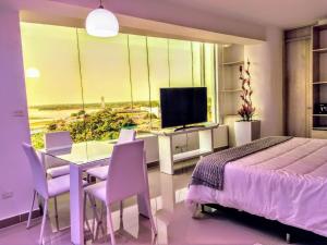 TV a/nebo společenská místnost v ubytování Hotel Súper Estrellas