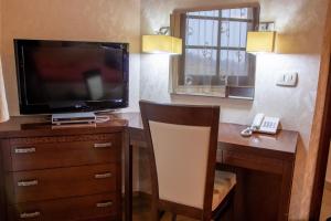 TV a/nebo společenská místnost v ubytování Vila Silva Marija Apartments