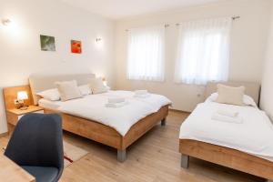 Postel nebo postele na pokoji v ubytování Guest House Ankora