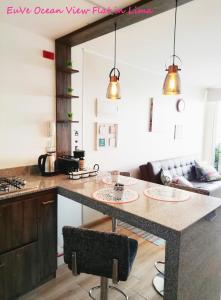 A kitchen or kitchenette at EuVe Ocean View Flat in Lima