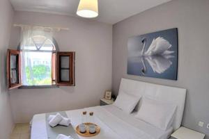 Postel nebo postele na pokoji v ubytování Calma Luxury Apartments #1 Sozopoli in Halkidiki