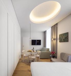 Μια τηλεόραση ή/και κέντρο ψυχαγωγίας στο Lisbon Serviced Apartments - Madalena