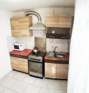 Dapur atau dapur kecil di Nice2GreetYou