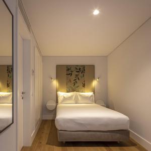 Ένα ή περισσότερα κρεβάτια σε δωμάτιο στο Lisbon Serviced Apartments - Madalena