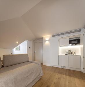 Η κουζίνα ή μικρή κουζίνα στο Lisbon Serviced Apartments - Madalena