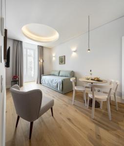 Ένα ή περισσότερα κρεβάτια σε δωμάτιο στο Lisbon Serviced Apartments - Madalena