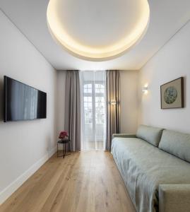 Μια τηλεόραση ή/και κέντρο ψυχαγωγίας στο Lisbon Serviced Apartments - Madalena