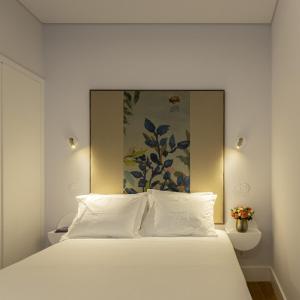Ένα ή περισσότερα κρεβάτια σε δωμάτιο στο Lisbon Serviced Apartments - Madalena