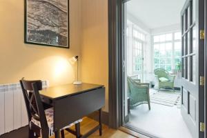 a home office with a desk and a chair at The Manor Suite at Moyglare House in Maynooth