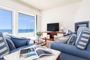 Televisyen dan/atau pusat hiburan di Residence Estrela do Mar