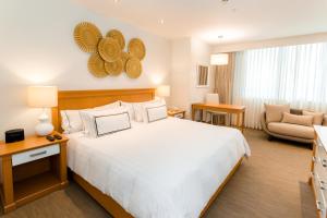 Rúm í herbergi á Hotel Melia Lima