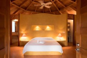 Voodi või voodid majutusasutuse Hotel Playa Negra toas